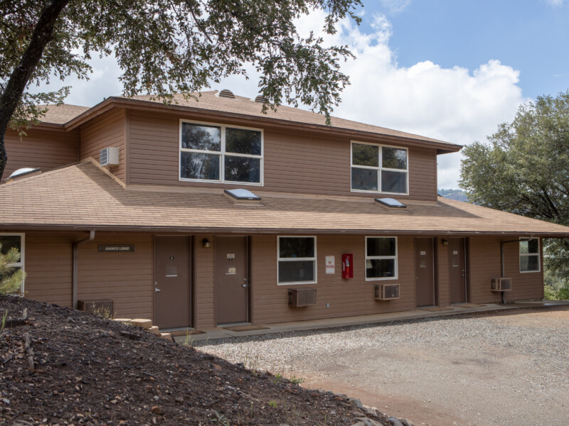 Juanico Lodge exterior with parking lot